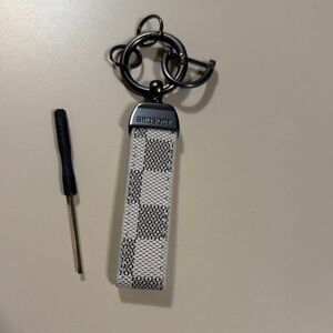 Black and White Checkered Keychain with Tool